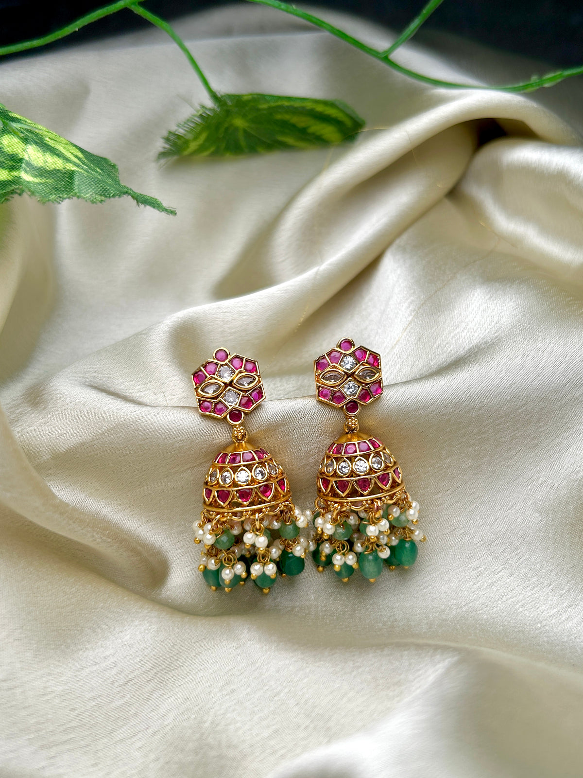 Opulent Kundan and Kemp Stone Pearl Layered Jhumka